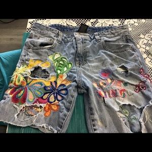 One of kind hand embroidered denim shorts